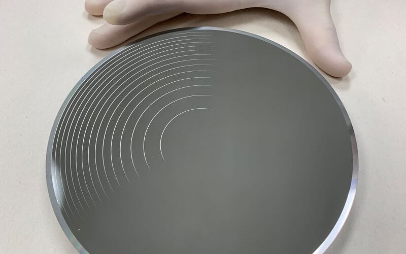 Diamond turning machine creating precision aspheric optical surfaces for infrared aerospace applications