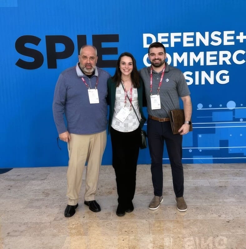 AMF Optics team at SPIE Defense & Commercial Sensing conference showcasing precision optical manufacturing