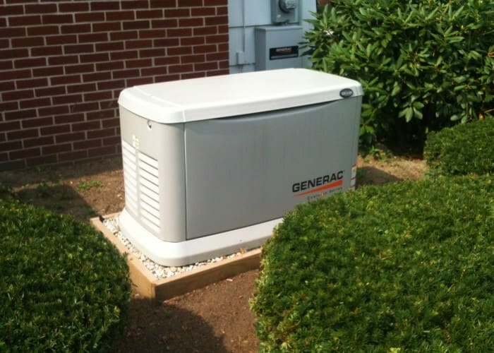 Generac generator installed outside home