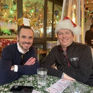 Brian and Chris celebrating the holidays with their team
