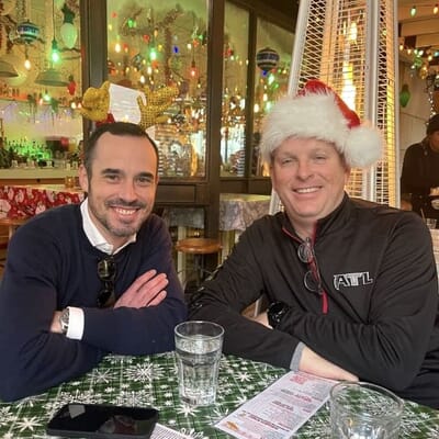 Brian and Chris celebrating the holidays with their team