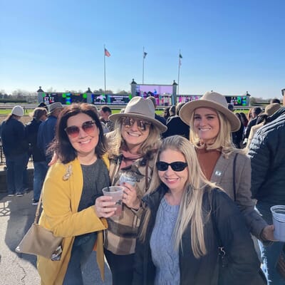 Andrea, Ashley, Meredith, and Charlotte at a company retreat in Keeneland, KY
