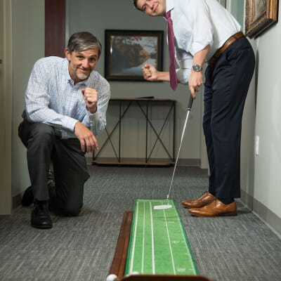 Cahaba employees office golf break