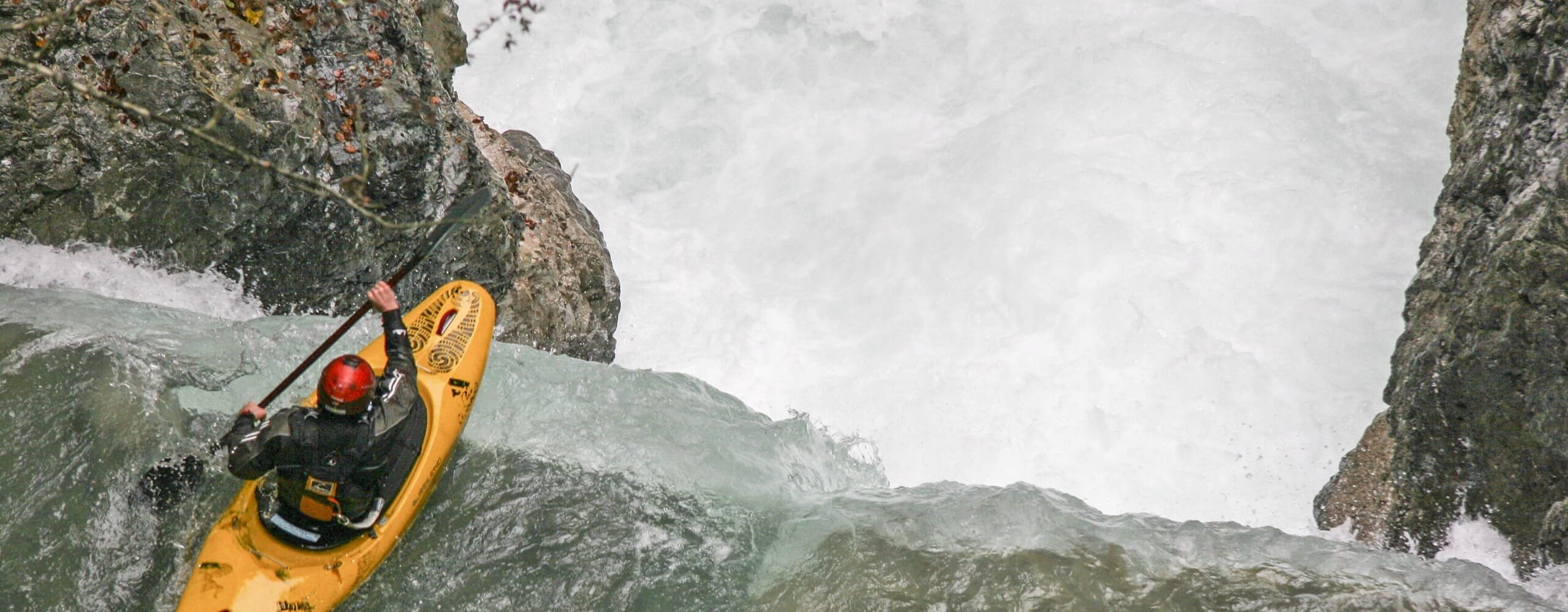 Kayak going over the falls