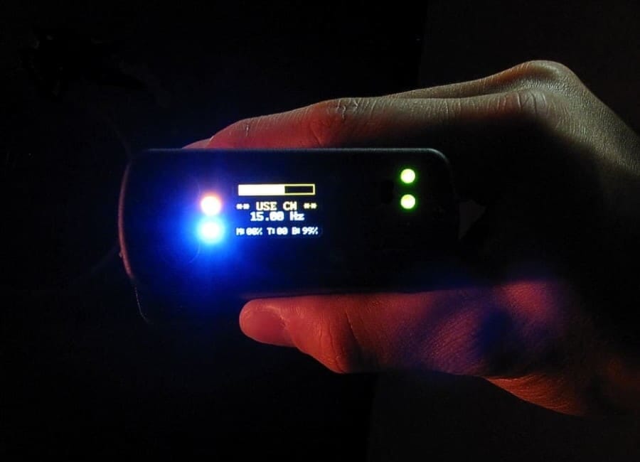 Handheld sensor with glowing colored lights