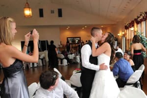 Bride and groom dancing and kiss