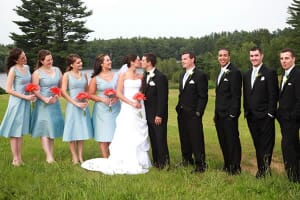 Wedding pictures in a grassy meadow in Maine