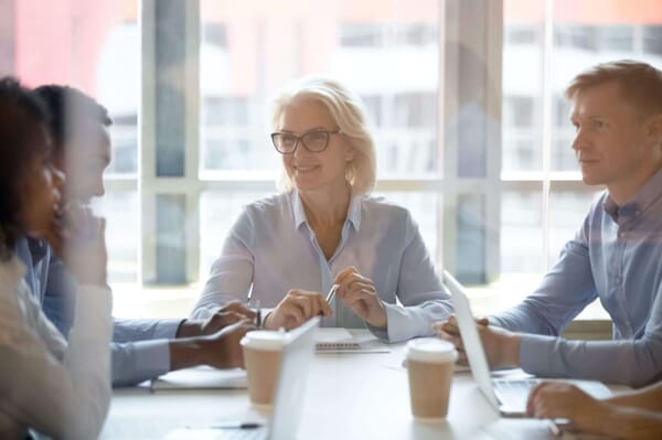 Female executive running meeting